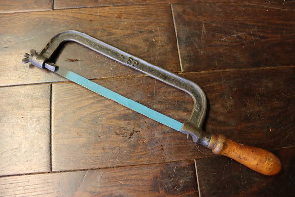 Hacksaw. 8". Boxwood handle and brass ferrule. FP8 (early Footprint?) Very good working order. 46229