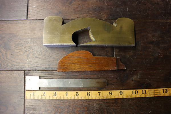 Shoulder/Rebate Plane. Gunmetal with steel sole. Mahogany infill. Small chip to corner of mouth as shown. 46278