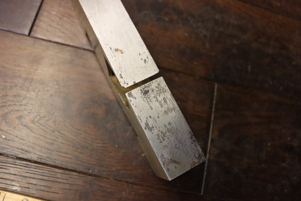 Shoulder/Rebate Plane. Gunmetal with steel sole. Mahogany infill. Small chip to corner of mouth as shown. 46278