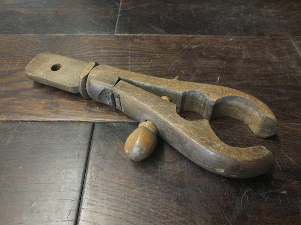 Wooden Test Tube Holder. Capacity up to 2" and 1 1/4" on two holes. Boxwood screw is loose.  46363