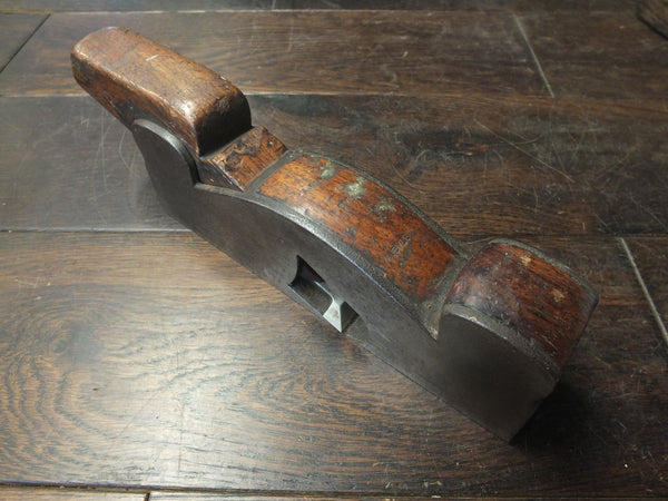 Shoulder Plane. Steel with infill. H Slater. Meredith St, Clerkenwell. circa 1873-77. 16.5 degree bed angle. Well tended plane, wedge and blade with wonderful details and beautifully cast/finished. 46343
