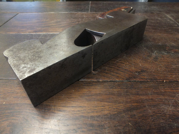 Shoulder Plane. Steel with infill. H Slater. Meredith St, Clerkenwell. circa 1873-77. 16.5 degree bed angle. Well tended plane, wedge and blade with wonderful details and beautifully cast/finished. 46343