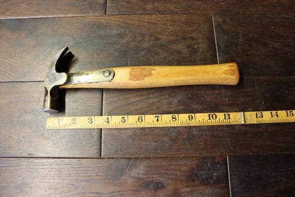 Strapped claw hammer. Beautifully made round head flat face. 9ozs. 46267