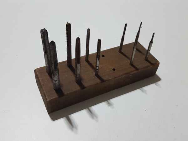 Mixed Set of 10 Small Taps in Wooden Stand 33293